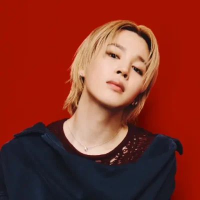 Jimin in rolling stone with a black long sleeve