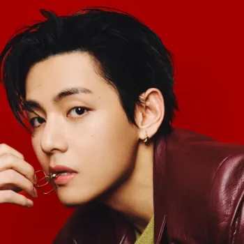 V in rolling stone with a red jacket